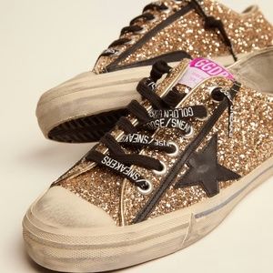 AUTHENTIC GOLDEN GOOSE - V-star LTD sneakers in gold glitter with black details